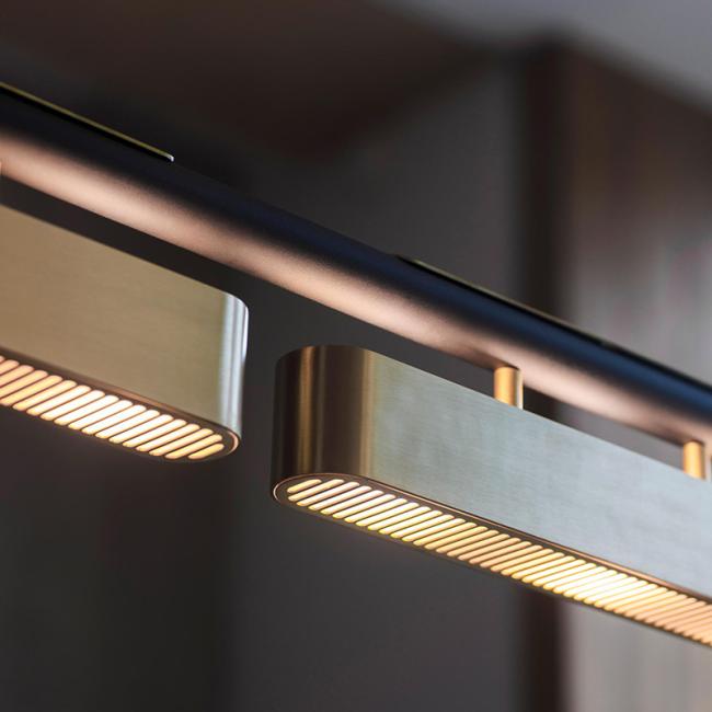 Close-up view of stainless steel and copper chandelier design