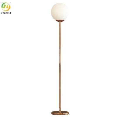 China Nordic Luxury Unique Design Globe Gold Standing Led Floor Lamps for sale