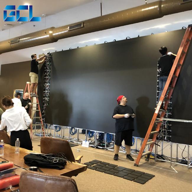 Professional installation of LED screen in commercial setting