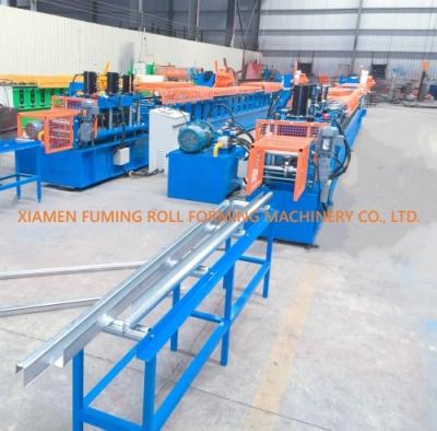 China 15KW Door Frame Roll Forming Machine Custom Profile Track Roll Former for sale