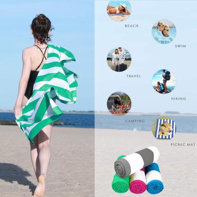 China Custom Printed Large Over Sized Jacquard Logo Quick-dry Soft Lightweight Sand Free Beach Towel Microfiber for sale