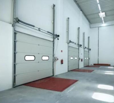 China 650N/M2 Wind Pressure Industrial Sectional Doors Sectional Overhead Garage Door European Standard Quality Modern Door for sale