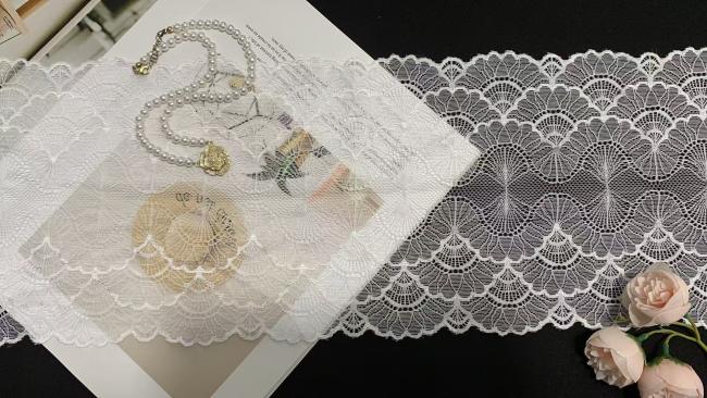 A1Z003 Guipure French Lace showing wavy edge design and maple leaf pattern