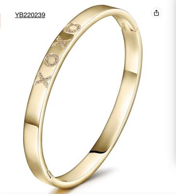 China 5mm Width XOXO Alphabet Gold Rhinestone Bracelet Stainless Steel Snap Bangle for sale