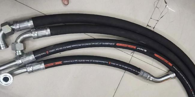 Hydraulic hose assembly crimping samples showing various hose connections