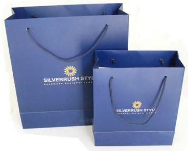 China Logo printed eco-friendly custom Paper Shopping Bags for sale