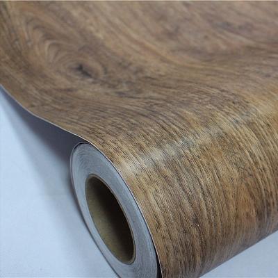 中国 質感の良い 木材の粒 PVC 自己粘着家具フィルム 60cm*10m 販売のため