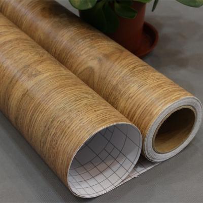 China 60cm*10m Filtro de plástico autoaderente fino de textura de madeira para móveis remodelados à venda