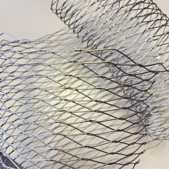 Knotted stainless steel rope mesh showing interwoven cable pattern