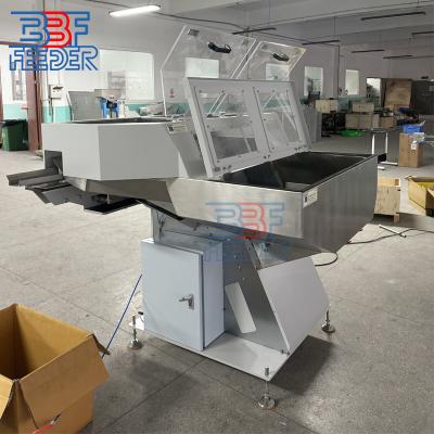 China Reciprocating Step Feeder Plastic Part Vibrating Electric Stepping Machine for sale