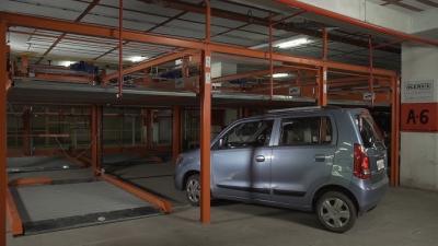 中国 Heavy Duty Puzzle Car Parking System With Motor Drive Chain Integration Solution 販売のため