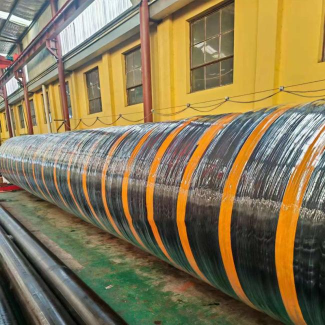 Floating dredge hose deployed in marine environment showing buoyancy and connection points