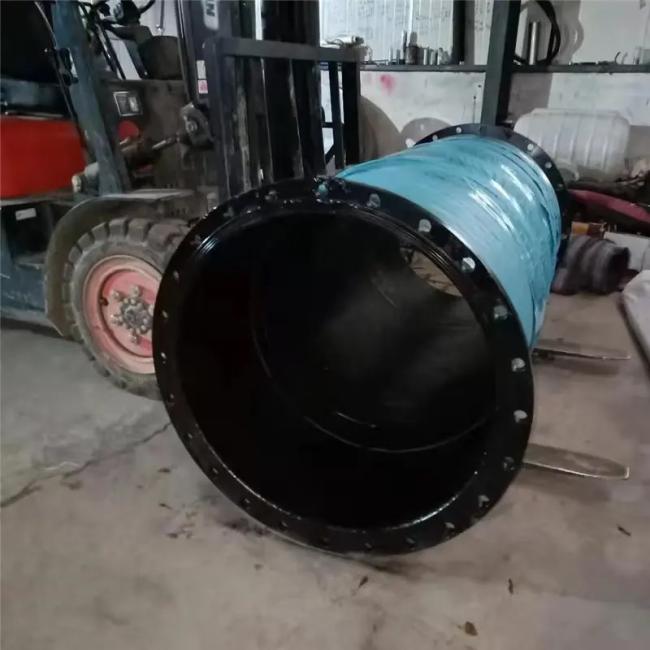Mining hose in industrial setting demonstrating flexibility