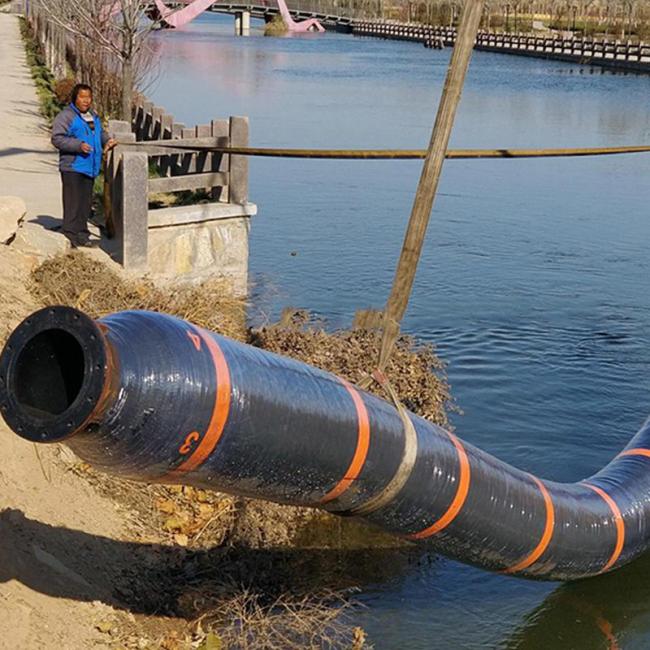 Close-up view of floating dredge hose construction
