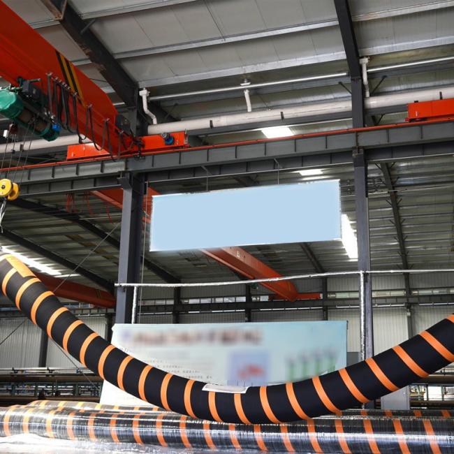 Floating dredge hose installation in river dredging project