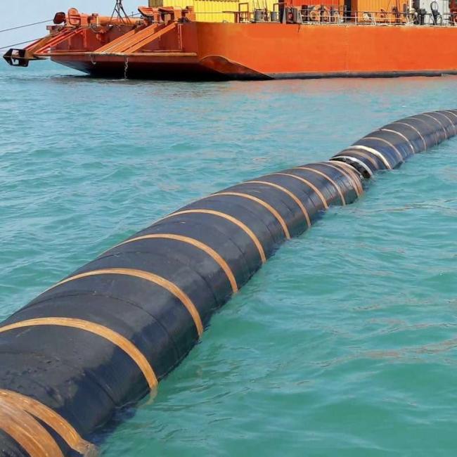 Close-up view of dredge hose construction and flotation system