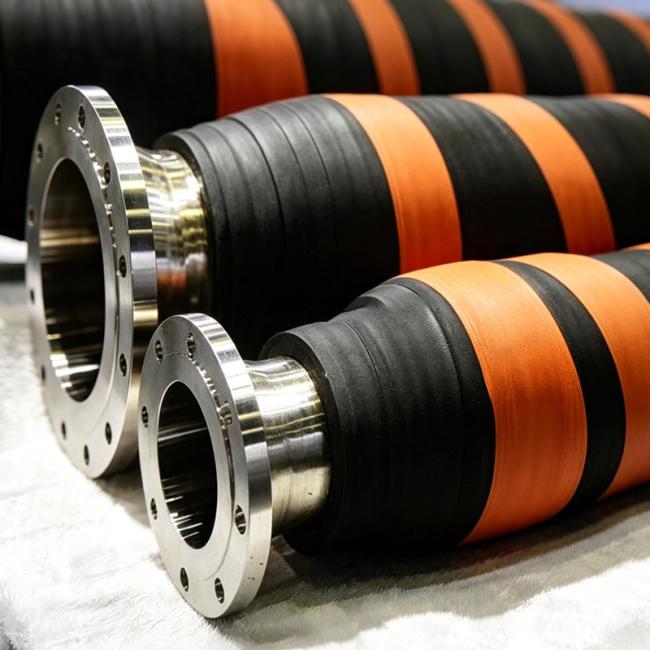 Floating dredge hose in operation on water surface