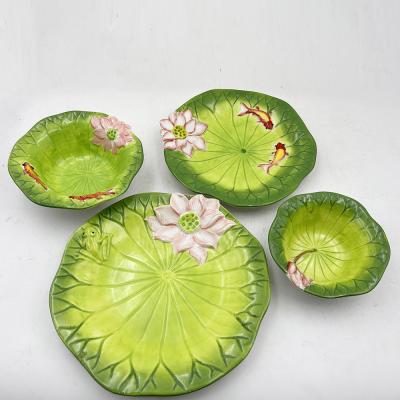 Chine Plaque de design personnalisée à feuilles de lotus fournitures de cuisine en céramique haute grande capacité plaque de dîner pour le pique-nique à la maison à vendre