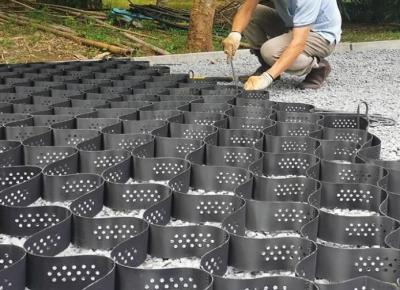 中国 道路工事のためのHDPEの砂利のテラスの安定装置のジオセルの格子 販売のため