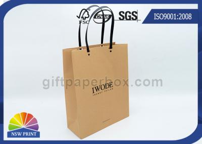 China Logo Printed Kraft Paper Bags Plastic Handles Brown Paper Shopping Bags FOR Garment for sale