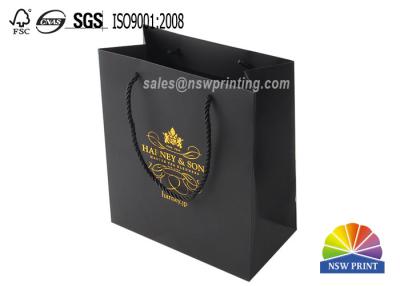 China Durable Black Cardboard Printed Paper Bags With Brand Monogram Gold Foil Stamping for sale