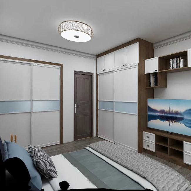 Modern sliding door wardrobe installed in residential bedroom setting