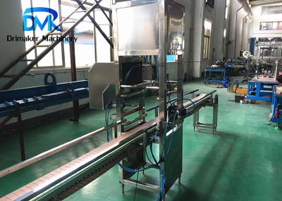 China Decapsuladora automática del alto rendimiento para que cadena de producción de relleno del agua del galón quite el casquillo usado en venta