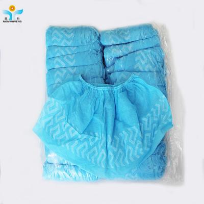 China 30gsm Non Slip Foot Covers Plastic Blue Non Woven Polypropylene Shoe Covers for sale
