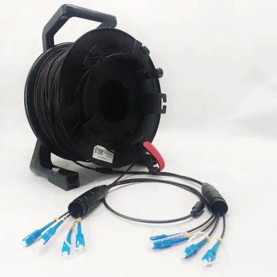 China Carrete de cable de fibra óptica táctica de campo portátil 500 metros en venta