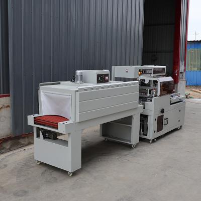 China Multi Function Heat Shrink Film Packaging Machine Food Auto Shrink Wrapping Machine for sale