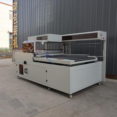 China ISO9001 Plastic Wrap Packaging Machine Pneumatic Tunnel Shrink Wrap Machine for sale