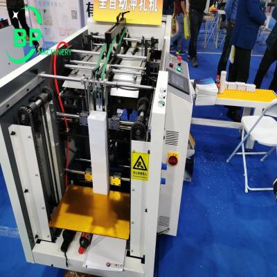 Chine Poinçonneuse de papier automatique APM420 pour la perforatrice de productions du fil o à vendre