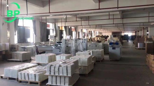 China automatic notebook single wire coil binding machine working in customer factory