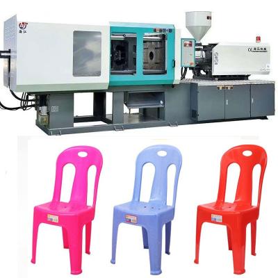 Cina 100-150g Injection Weight Small Vertical Injection Molding Machine With 2.5T Ejector Force in vendita