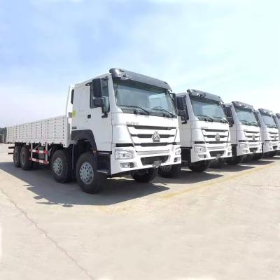 China Fence Truck Body Type Used Cargo Trucks Sinotruk Howo Fence Cargo Lorry Truck With Full Cargo Trailer à venda