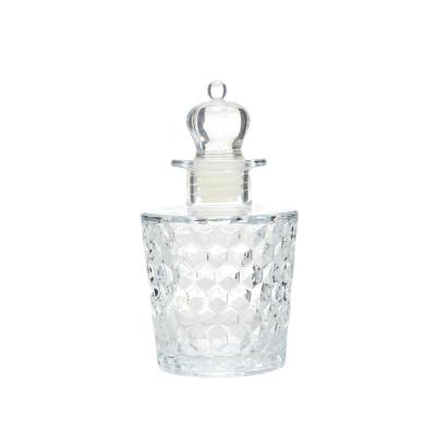 China Botellas de vidrio de difusión de caña de OEM Botellas de perfume de vidrio transparente en relieve en venta