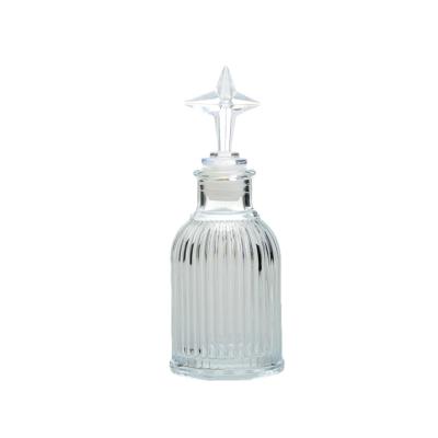 China Airtight Small Glass Diffuser Bottles 85ML With Fancy Cap LFGB for sale