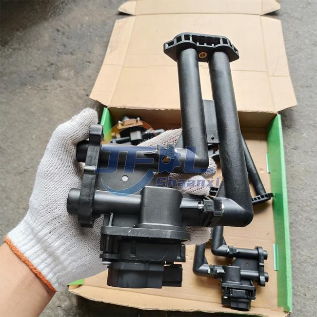 Close-up view of HVAC coolant supply pipe connections and reinforcement