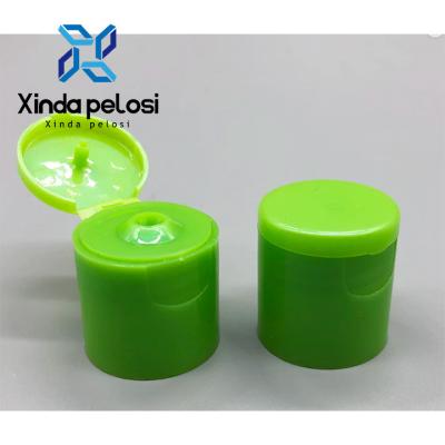 China Polish Blue 24/410 PP Smooth Surface Cosmetic Flip Top Bottle Caps For Cream Bottle for sale