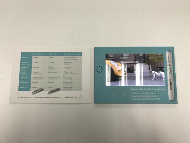 Custom 7-inch LCD video brochure in use for medical device presentation