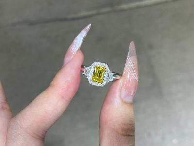 China Fancy Vivid Yellow 1ct Diamond Engagement Ring Emerald Shape IGI Certified for sale