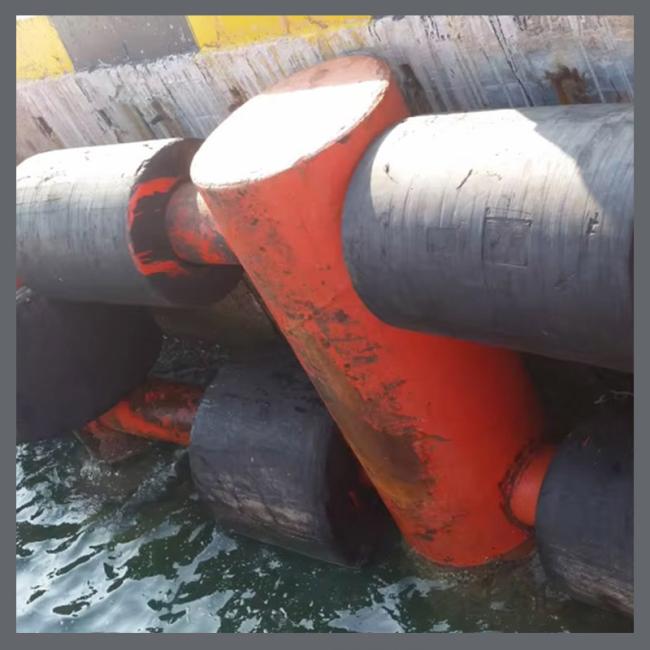 Close-up view of cylindrical fender in marine environment