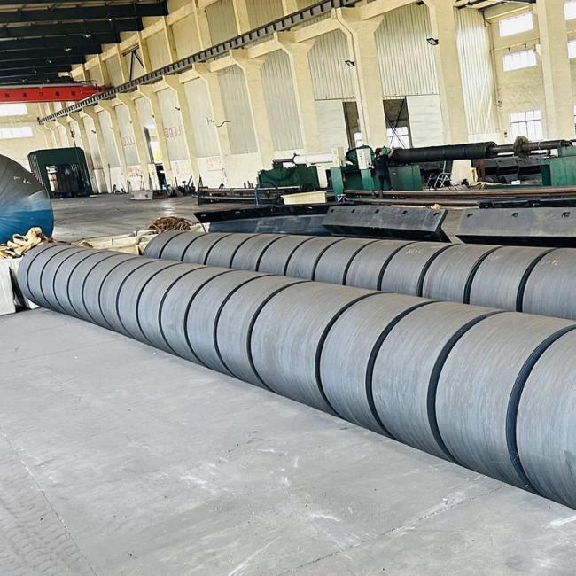 Close-up view of tug boat fender construction and mounting