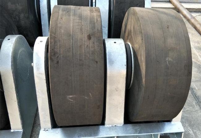 Close-up view of roller fender mechanism
