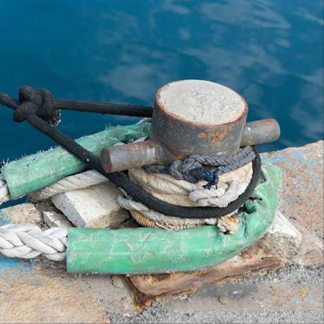 Heavy duty bollard in operational port environment