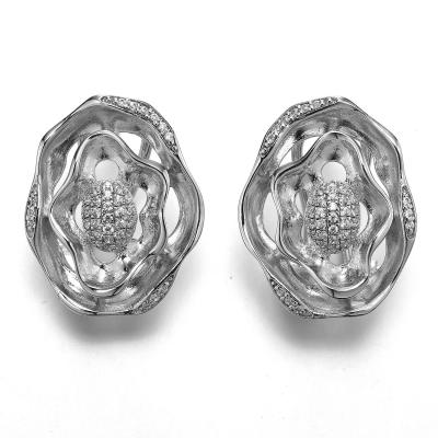 China Los pendientes del oro diseñan 925 pendientes ovales del puño del oído del remolino de los pendientes de plata de la CZ en venta