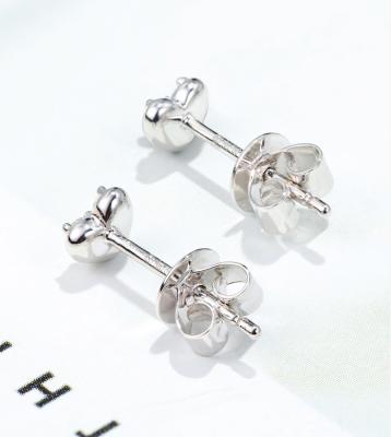 中国 純銀製の華麗な切られたダイヤモンドのあたりのハート形のスタッドのイヤリング0.80ct 販売のため