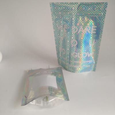 China Plastic Snack Food Packaging Holographic Tear Notch Mylar Bag Laser Line for sale
