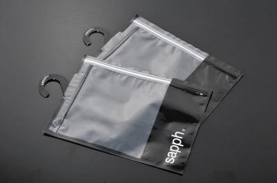 China Attractive Poly Bag Packaging Slider Zipper And Hanger For Cotton Socks for sale