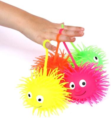 China Relieve Stress Kids Safe Toys Light Up Puffer Balls With String for sale